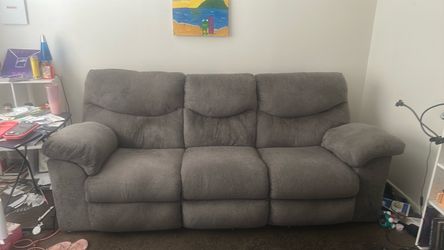 Gray Fabric Reclining Sofa and Foldable Table