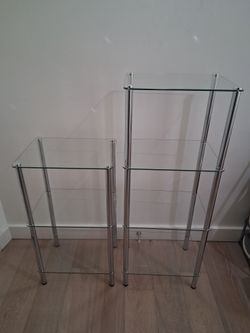 Two Freestanding Glass Shelving Units