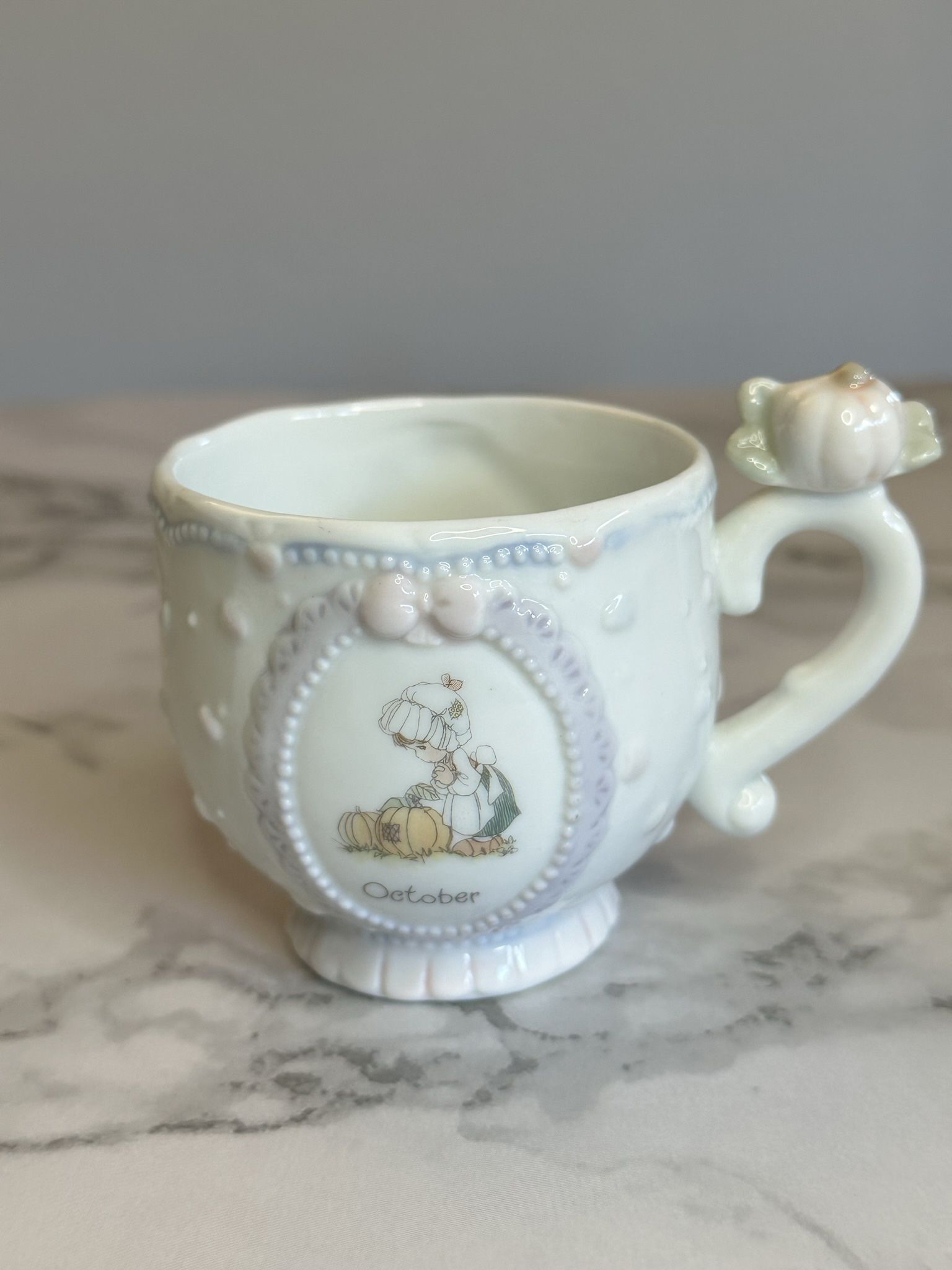 October Precious Moments Tea Cup