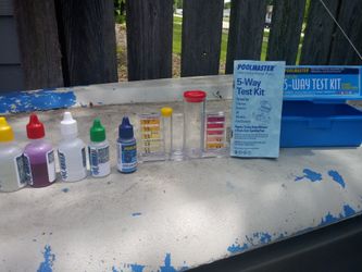 Pool test kit and vacuum