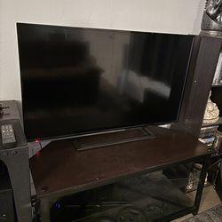 Flat screen TV (Sharp) and stand