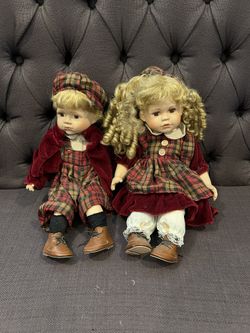 Porcelain Boy And Girl Dolls
