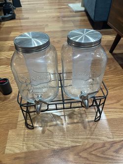 Two 1-gallon glass drink dispensers with stand