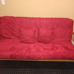 Wooden Futon With Red Cushion