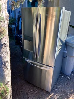 stainless refrigerator three door as is LG stainless refrigerator 3 door as is