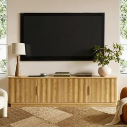 2231a  MINORA™ Arco Fluted TV Stand – Golden Oak  Bringing natural vibe and lightness to the focal point of the living room coordinates with solid woo