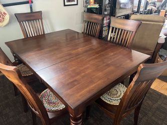 Gently Used Solid Wood Table 2 - 18" leaves and 8 - Chairs Table goes from 45" x 45" to 45" x 81"
