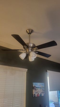 42-in brushed silver ceiling fan with three lights.
