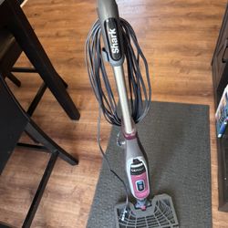 Genius Corded Steam and Spray Pocket Mop for All Hard-Floor Surfaces in Red with Steam Blaster Technology & 3 Settings