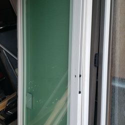 Nearly brand new patio sliders with mini-blinds
