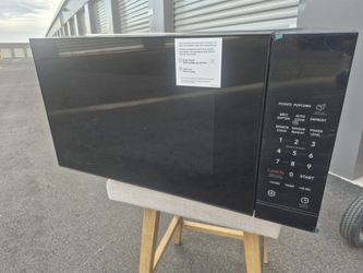 New Frigidaire 2.2 cu.ft microwave