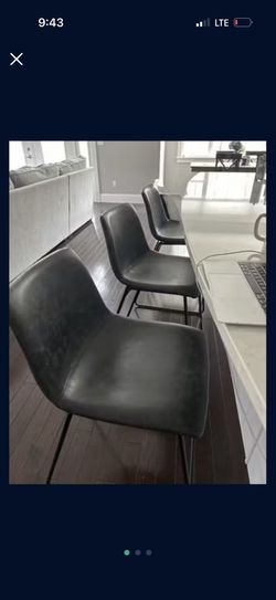 Three Counter height Chairs