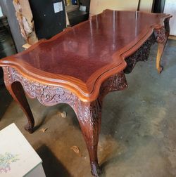 Luxurious Mahogany desk with intricate detail