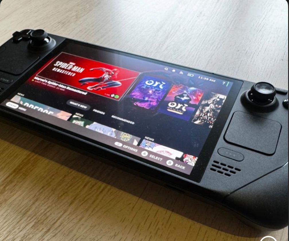 Steam Deck Oled 1 Terabyte With Screen Protecter On It N Comes With Fan 