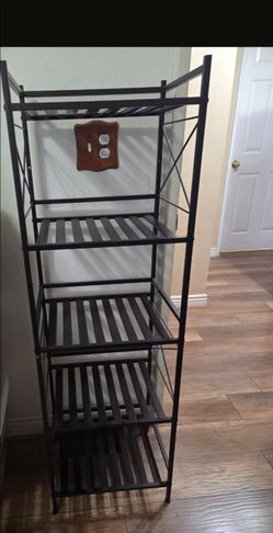 Metal bookshelf  good condition