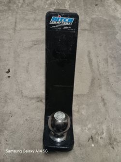 Tow hitch drop down