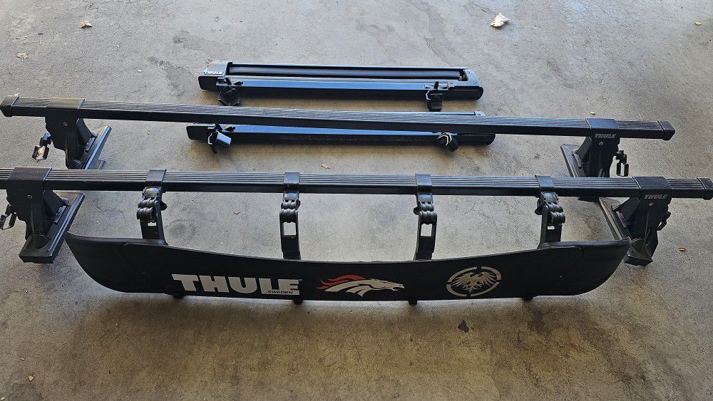 Thule crossbars and ski/snowboard carrier