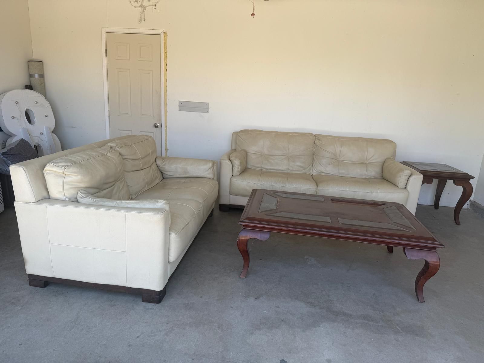 leather couch set with tables