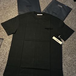 Black essential fear of god shirts