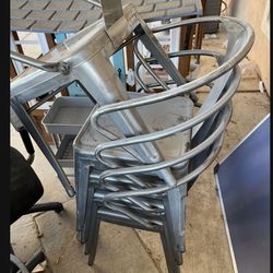 5 metal chairs