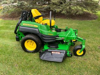 John Deere z925a commercial zero turn lawn mower with a Kawasaki and a 60 in deckI
