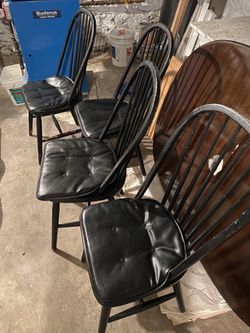 Four black Windsor Chairs