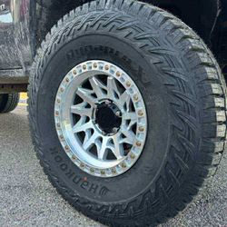 17X9 LOCK OFF ROAD WHEELS AND TIRES 37 1250 17 HANKOOK XT