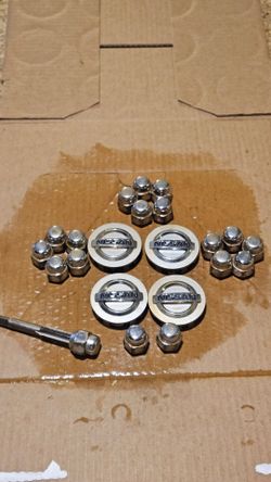 Nissan oem wheel caps lug nut