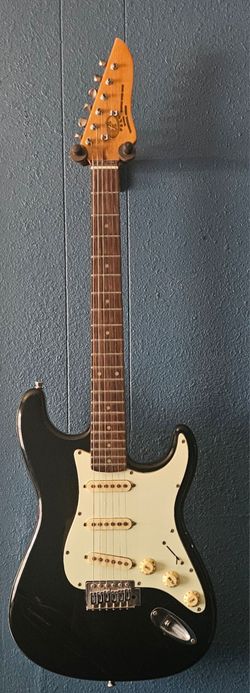 Black Stratocaster-Style Electric Guitar