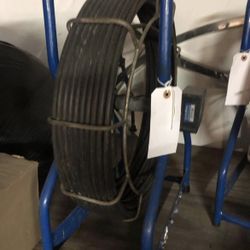 Small rolls of sewer camera cables