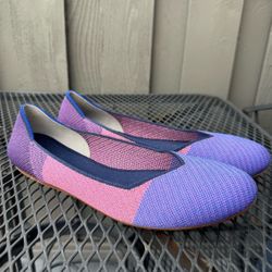 Rothy's flats in women's size 11 in a purple/fuchsia color.