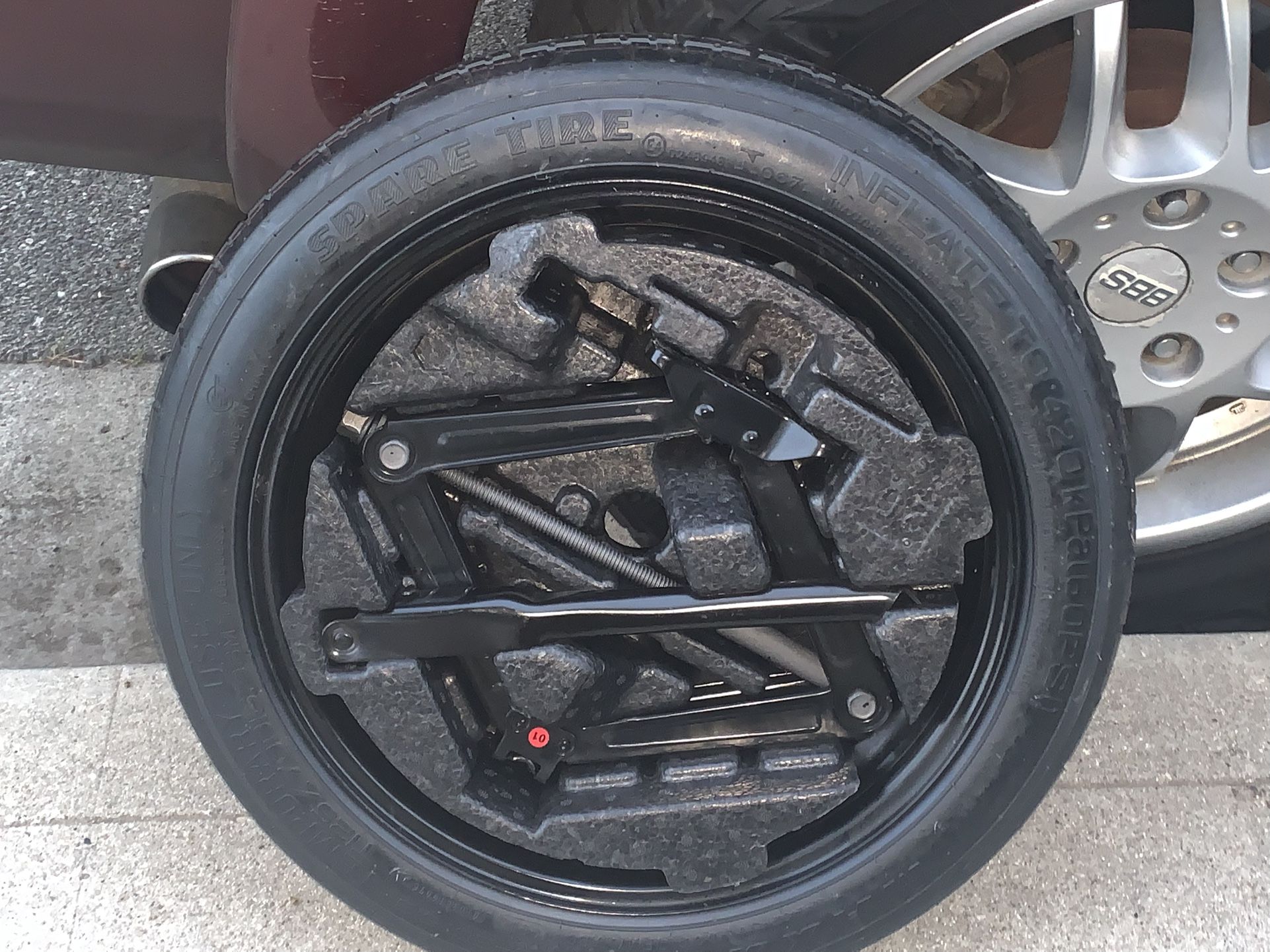 NEW SPARE TIRE WITH JACK KIT