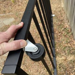 Metal twin mattress trundle: fits under bed and rolls out. Great for guests!