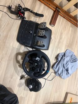 logitech wheel, pedals, and shifter