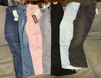 GIRLS 7 PAIR SIZE 10 PANTS/ 1 PAIR GIRLS SIZE 14 PLUS PANTS