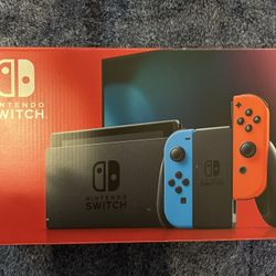 Nintendo Switch Bundle – 2 Joy-Con Sets, 2 Games, Case, Box