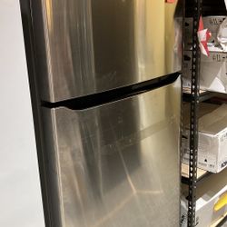 24 cu. ft. Top Mount Freezer Refrigerator with Multi-Flow Air System in Stainless Steel, Garage Read