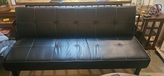 Black leather coach