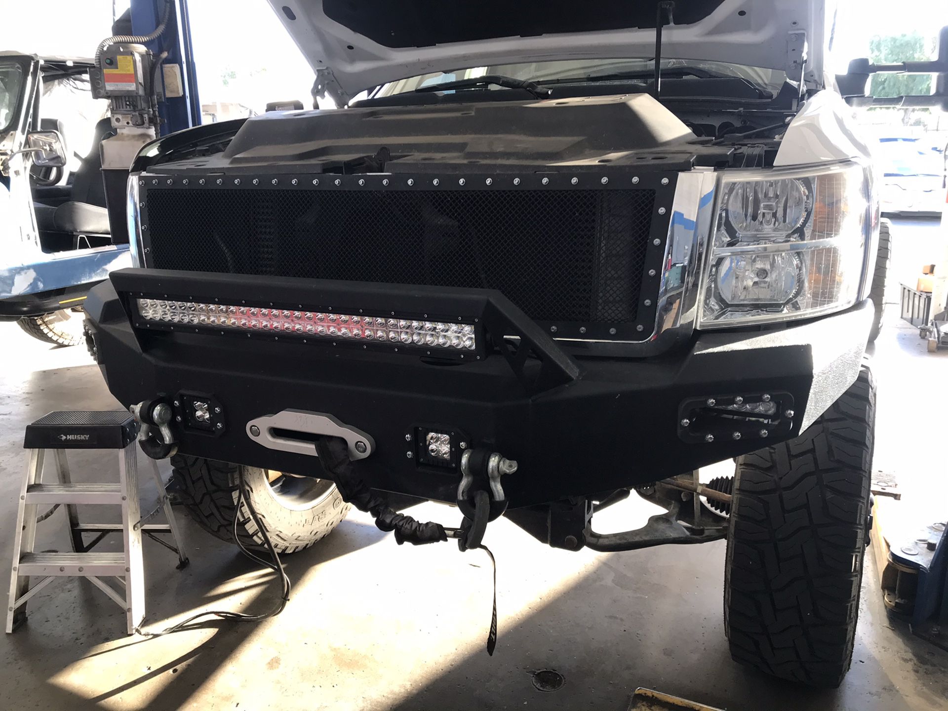 Front aftermarket heavy duty bumper with LED lighting and Smitty built Winch and control!!