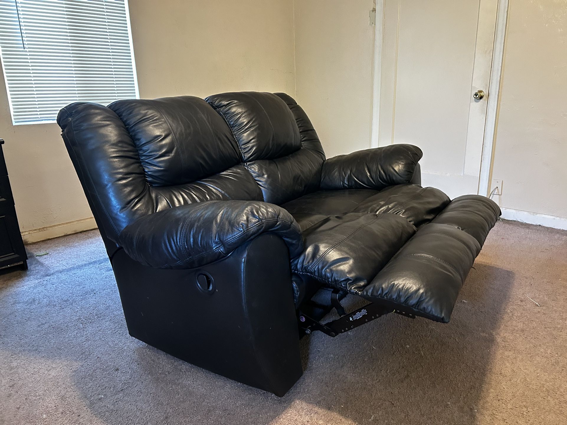 Leather Reclining Loveseat