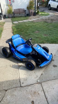 Kid’s racing Electric Ride-On Go-Kart racing car works excellent  charger Included everything is working  powerful ready for fun