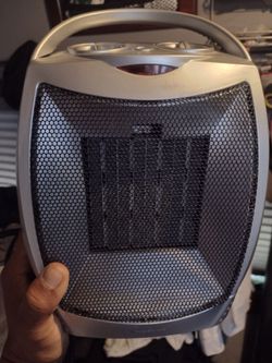 Small room heater/ calentador ambiental