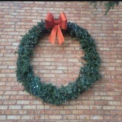 Artificial 54-in LED Light Up Wreath. Comes With Free 24 Inch Artificial Reef