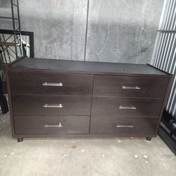 Brown dresser with night stand