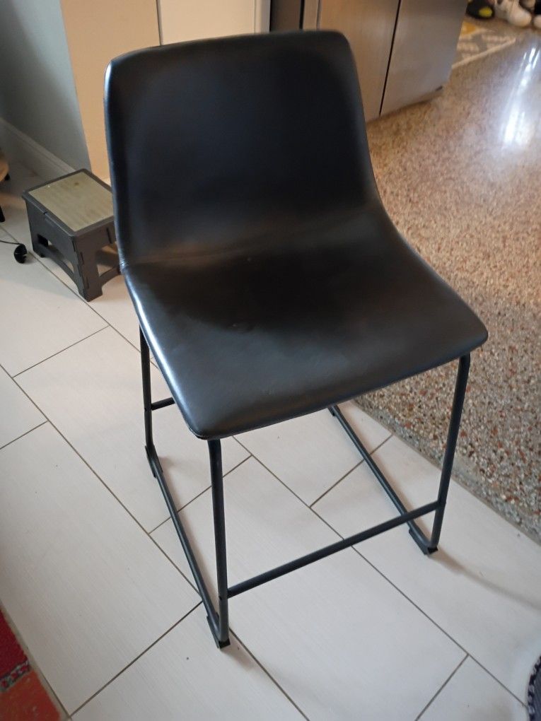 4 dark grey pleather high chairs (Willing to sell two for $40)