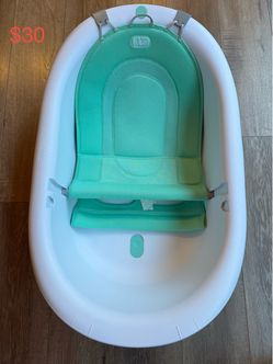 Frida Baby 4-in-1 Grow-With-Me Bath Tub + FREE Baby Rinse Helper – $30