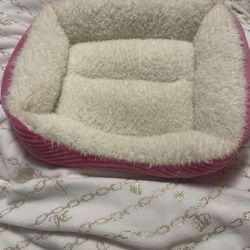 Pink and white animal bed 