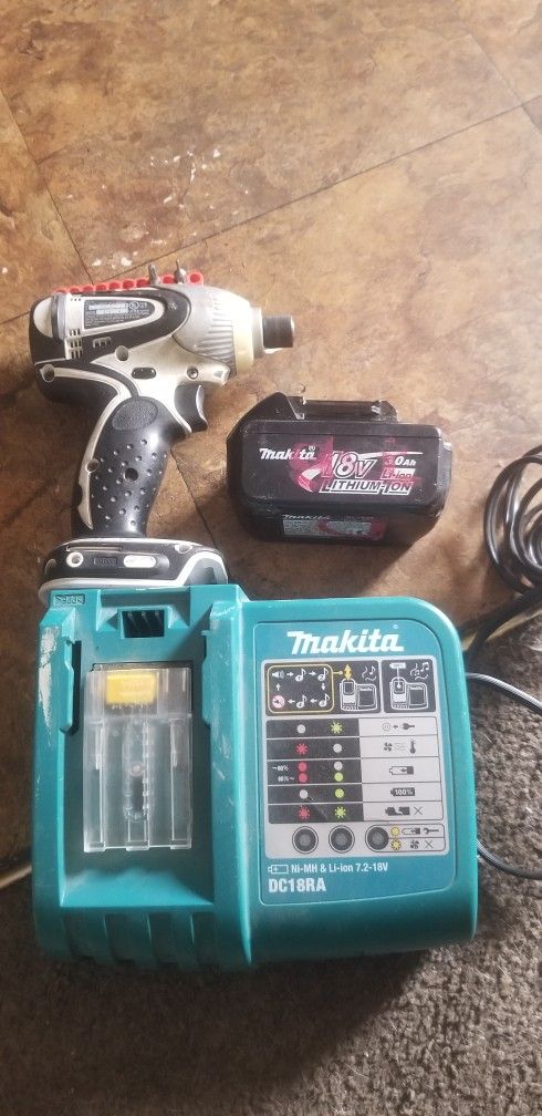 MAKITA 18V 1/4 IN.HEX IMPACT DRIVER AND RAPID CHARGER(NO BATTERY)