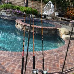 Three (3) Saltwater Fishing Rods and Reels with A BIG Tackle box loaded with lures,Sinkers,hooks,ect