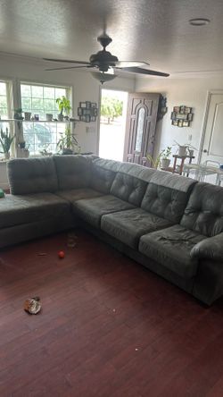 Couch with Chase one burn mark on cushion